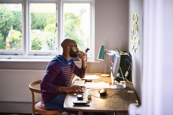 Young adult male on the computer